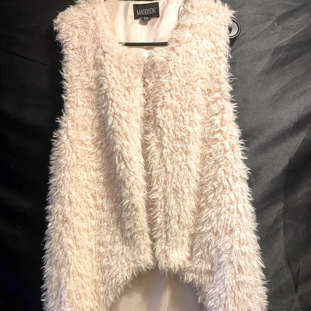 Faux fur ling vest. BEAUTIFUL and I love it.